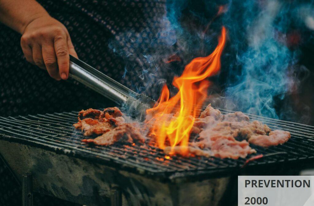 Close-Up Photo of Man Cooking Meat